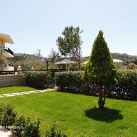 08 Natassa lawn and gated pool terrace