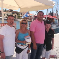 Andrew and his family on Chania Harbour