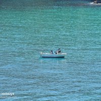 Boat and turquoise sparkling water