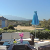 11 Nina outside lounging area with view to sand pit and mountains