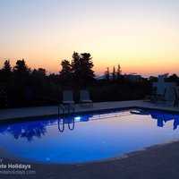 03 Olive Grove Villa pool terrace at dusk.